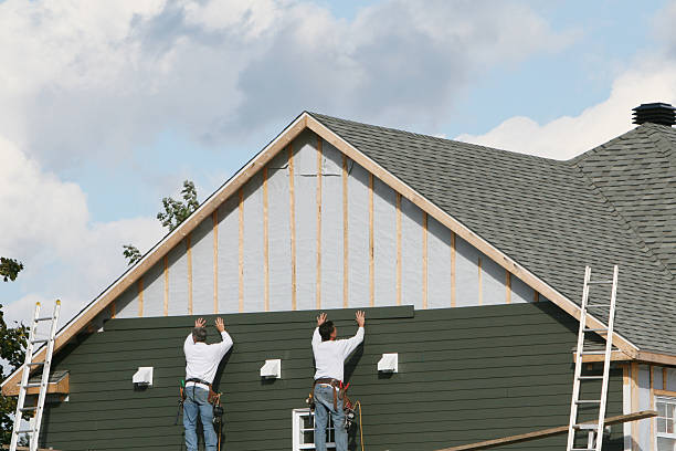 Professional Emergency Siding Repair technician working in Columbus, NC